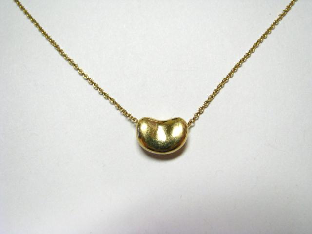 Appraisal: K Yellow Gold Tiffany Bean Pendant on necklace