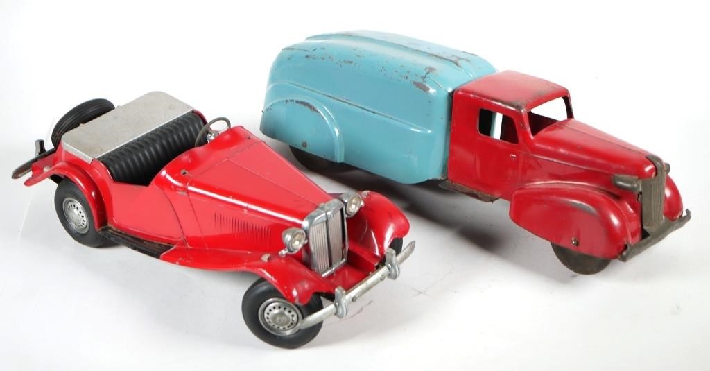 Appraisal: TWO VINTAGE PRESSED STEEL TOY VEHICLESTwo toy vehicles including red