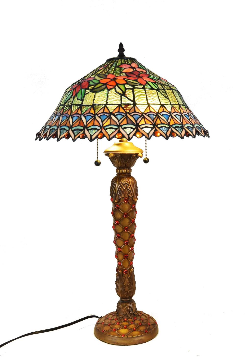 Appraisal: MODERN FLORAL-DECORATED STAINED GLASS TABLE LAMPThe domed shade with poinsettia