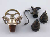 Appraisal: An unusual patented late Victorian bottle stopper with two covered