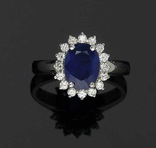 Appraisal: SAPPHIRE AND DIAMOND RING White gold Classic ring the top