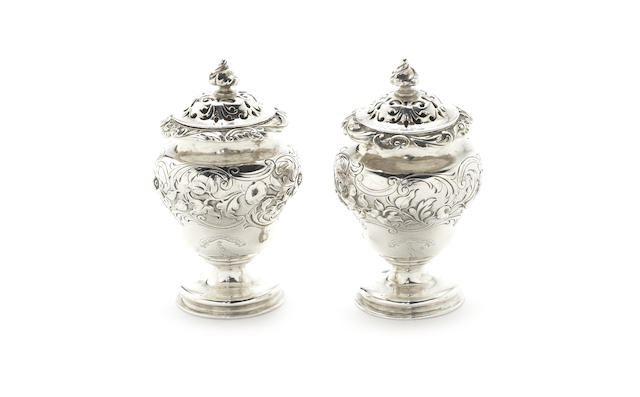 Appraisal: A pair of William IV silver peppers by Paul Storr