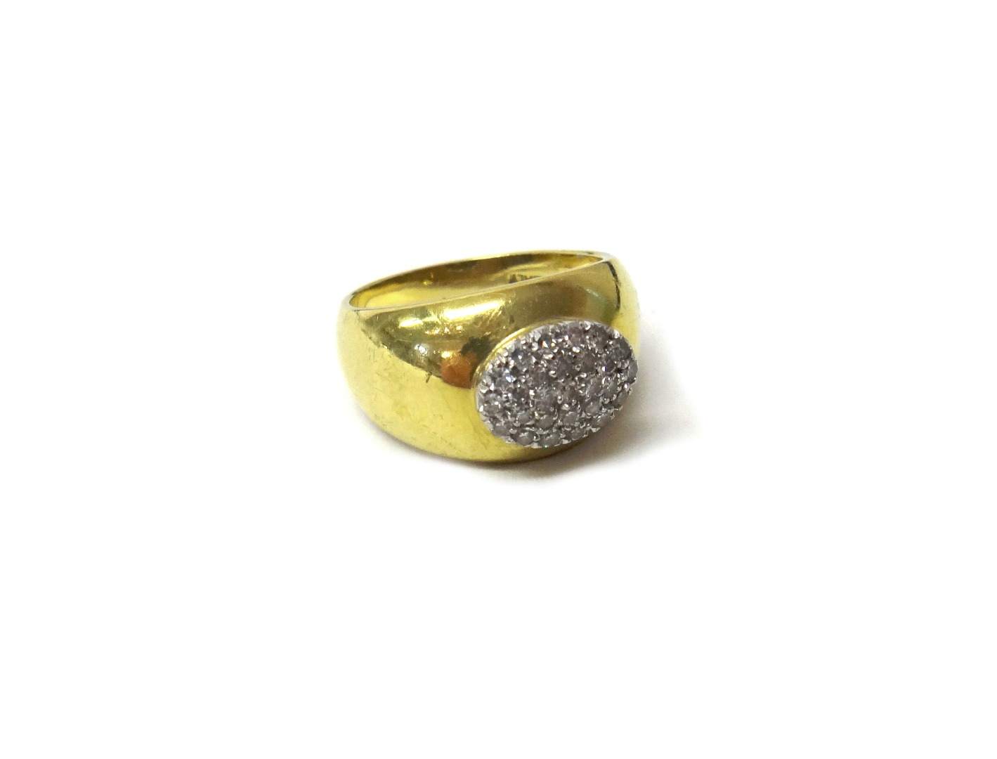 Appraisal: An Italian gold and diamond set oval cluster ring mounted