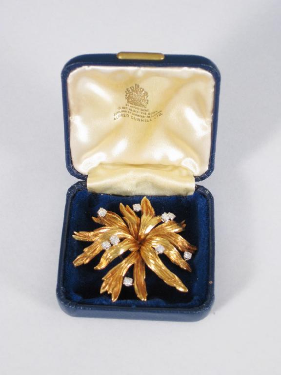 Appraisal: A modern ct gold Flower Brooch set nine diamonds London