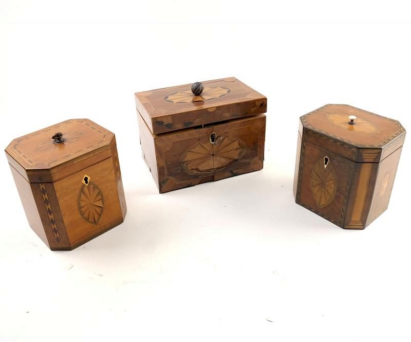 Appraisal: Late Georgian Tea Caddies Three Late Georgian tea caddies with