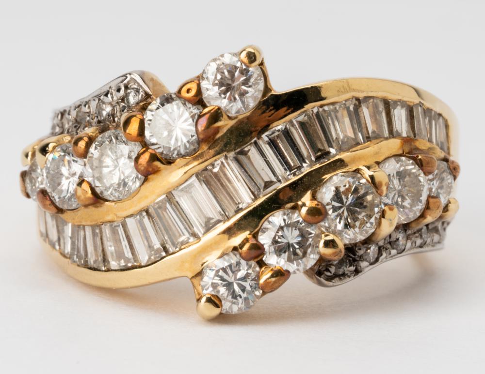 Appraisal: KARAT YELLOW GOLD DIAMOND RINGContaining full and baguette cut diamonds