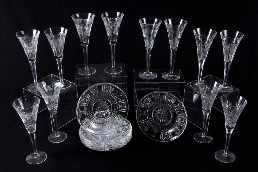 Appraisal: WATERFORD MILLENIUM CRYSTAL FLUTES PLATES To include champagne flutes of