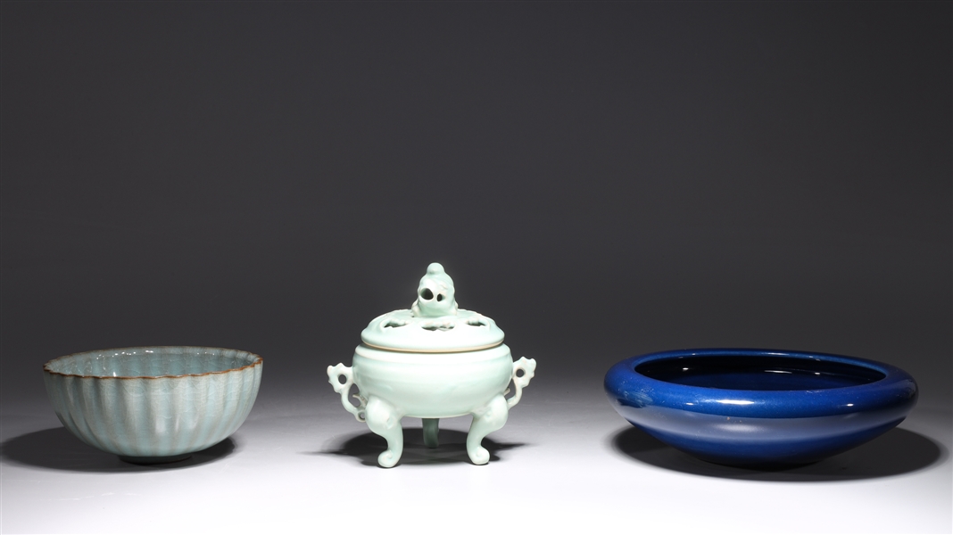 Appraisal: Group of three Chinese glazed porcelains including blue monochrome brush