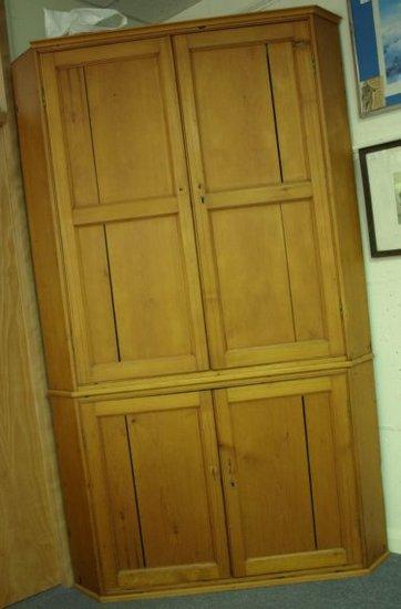 Appraisal: A th Century pine corner cupboard upper section two doors