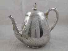 Appraisal: A Victorian silver teapot with bright cut engraving of ferns