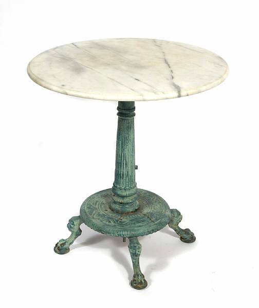 Appraisal: A patinated metal and marble garden table height in diameter