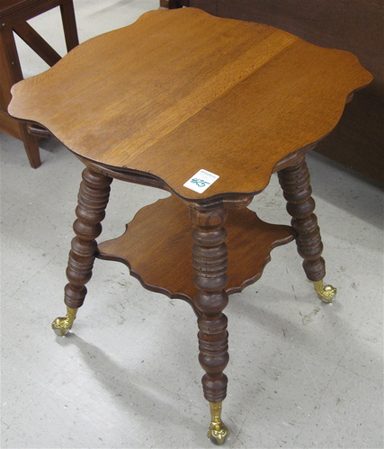 Appraisal: VICTORIAN STYLE OAK LAMP TABLE having a square serpentine oak