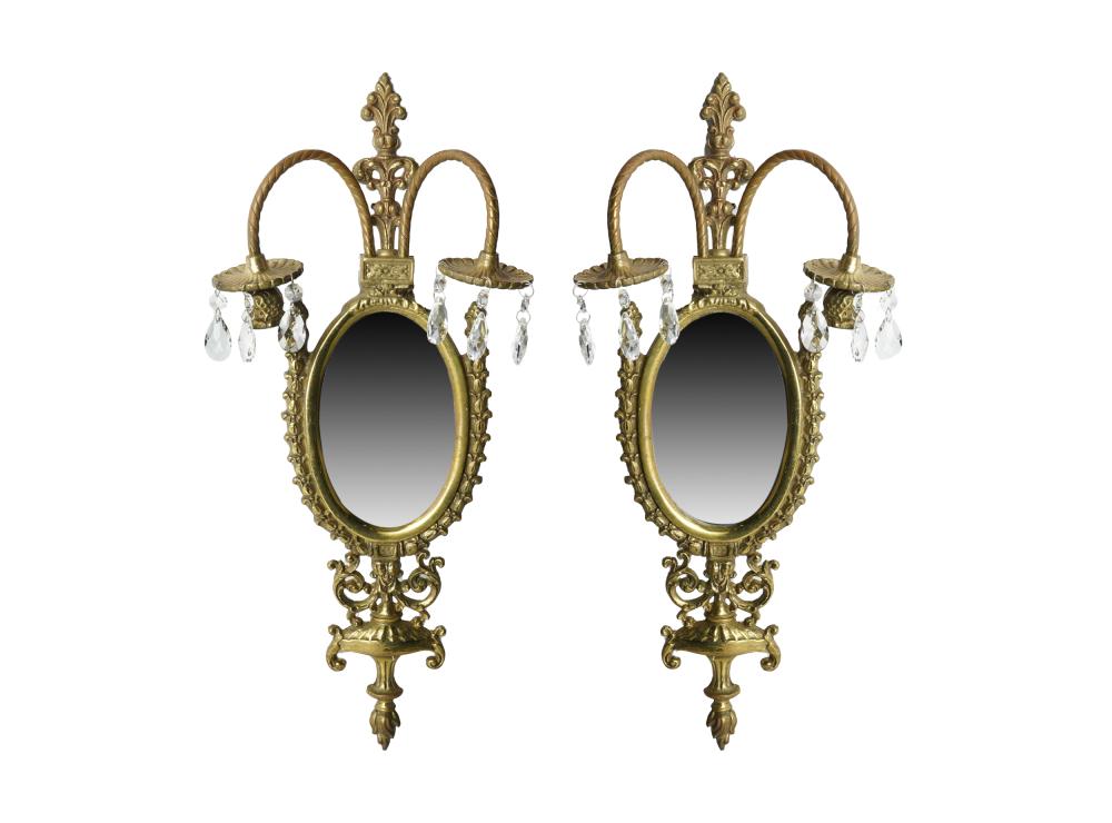 Appraisal: PAIR OF NEOCLASSIC STYLE BRASS MIRROR APPLIQUESwith twin sockets and