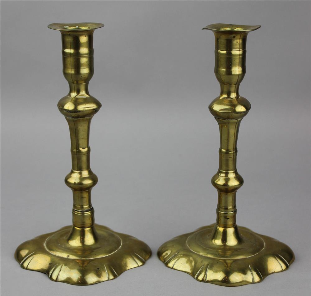 Appraisal: TWO QUEEN ANNE BRASS CANDLESTICKS circa on shaped square bases