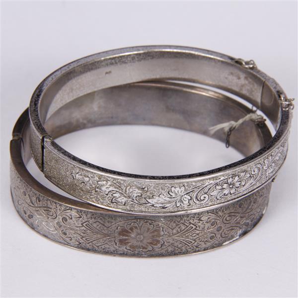 Appraisal: Two Victorian Hollow Hinged Sterling Bangle Bracelets with etched decoration