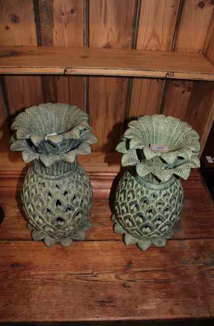 Appraisal: A PAIR OF POTTERY CANDLE SHADES in the form of