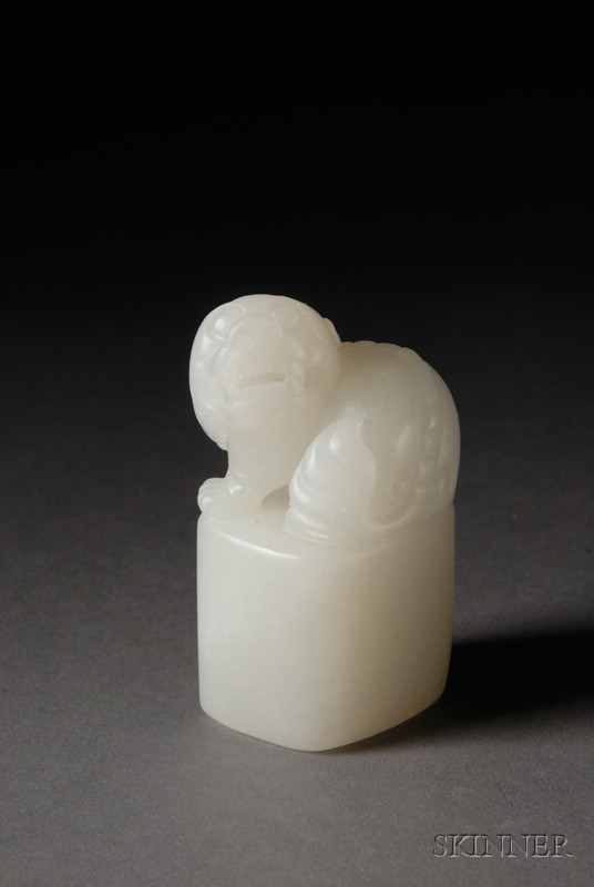 Appraisal: Pure White Jade Seal foo dog finial ht in