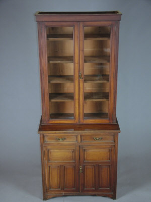 Appraisal: A late Victorian bookcase the moulded cornice above two glazed