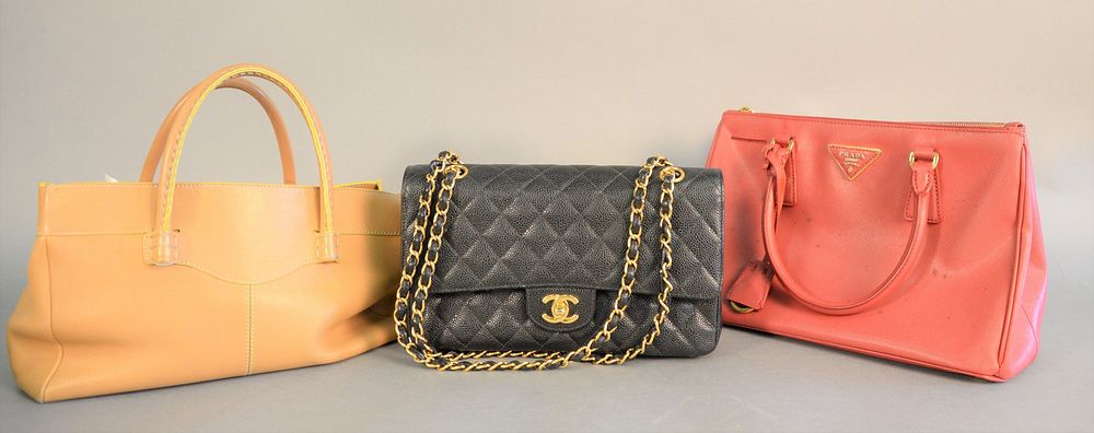 Appraisal: Group of four purses and wallets including Prada red handbag