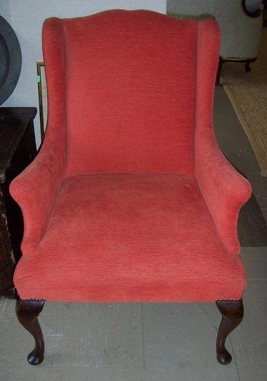 Appraisal: A wing back armchair on cabriole legs