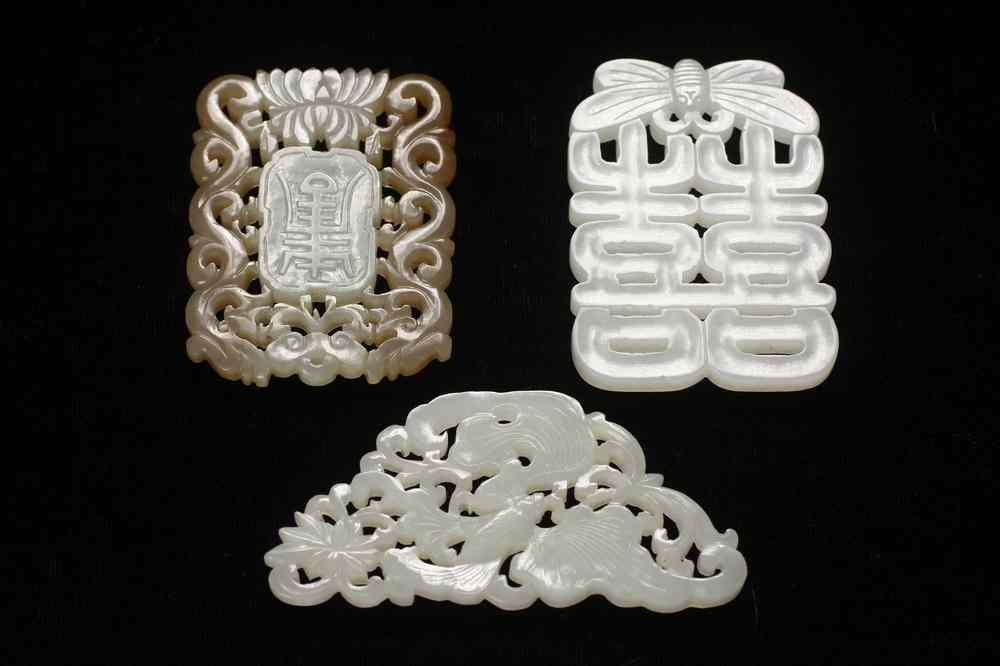 Appraisal: CHINESE JADE PENDANTS - Three th c Chinese Carved Jade