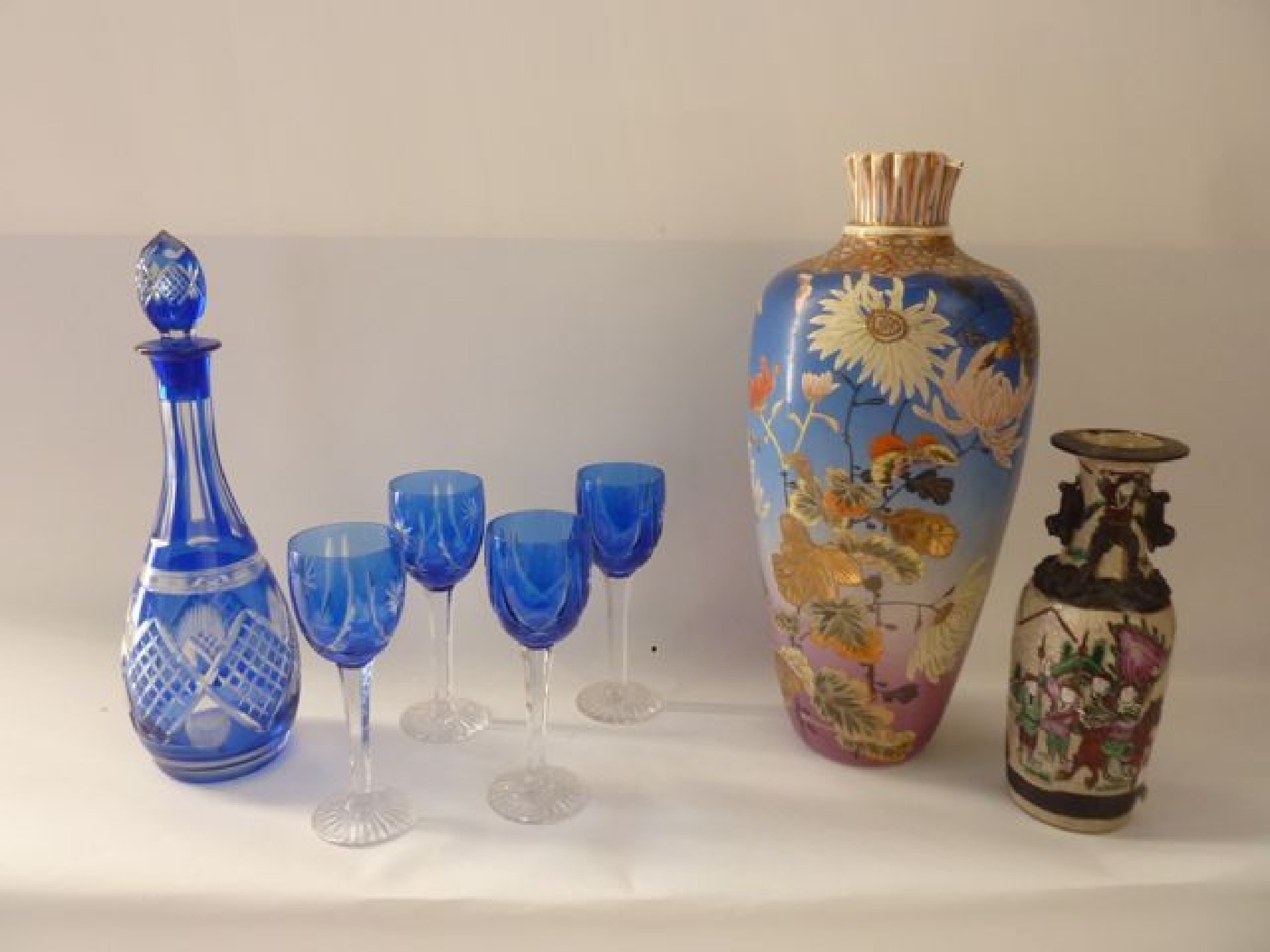 Appraisal: A cameo cut clear and cobalt blue glass decanter with