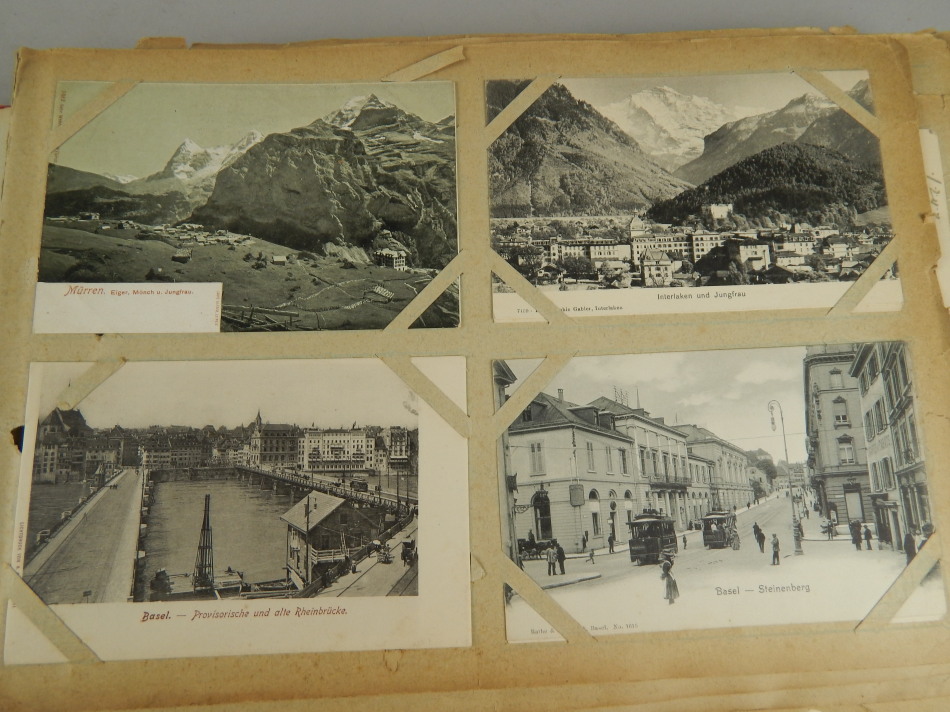 Appraisal: An album of mainly topographical real photo postcards