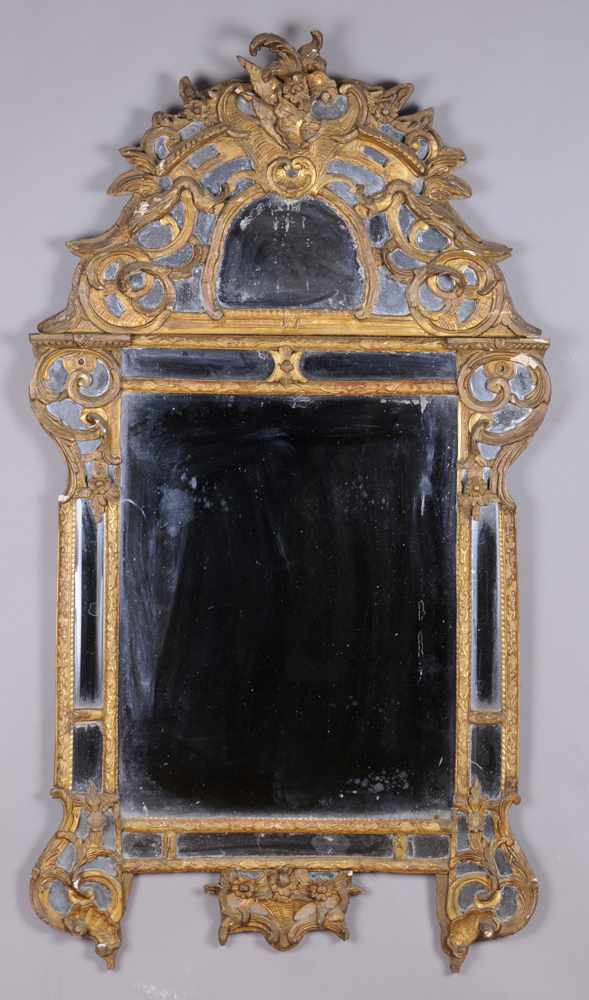 Appraisal: R GENCE CARVED GILTWOOD MIRROR With beveled main and border