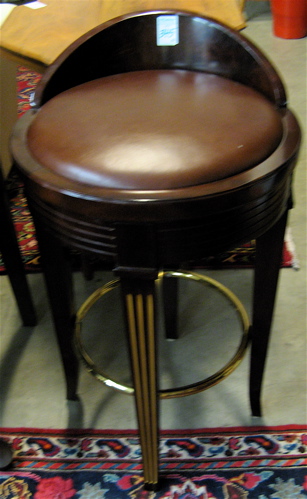 Appraisal: A PAIR OF NEOCLASSICAL STYLE MAHOGANY BARSTOOLS each with low