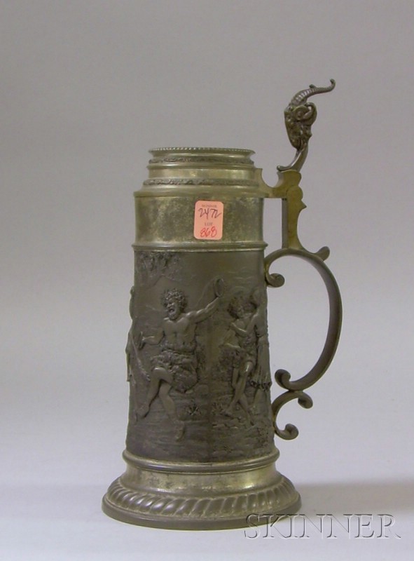 Appraisal: Late Victorian Pewter Lidded Tankard Decorated with Bacchanalian Scene in