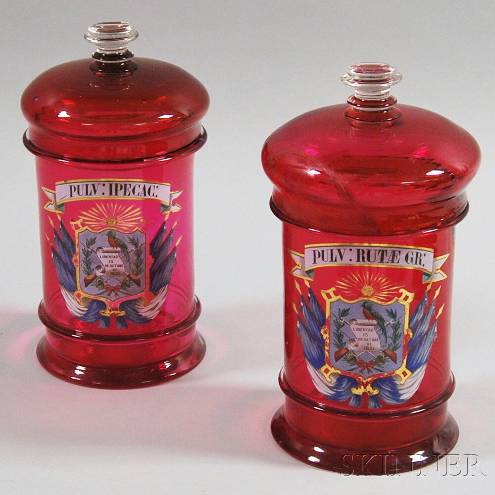 Appraisal: Pair of Cranberry Glass Apothecary Jars Europe th century the