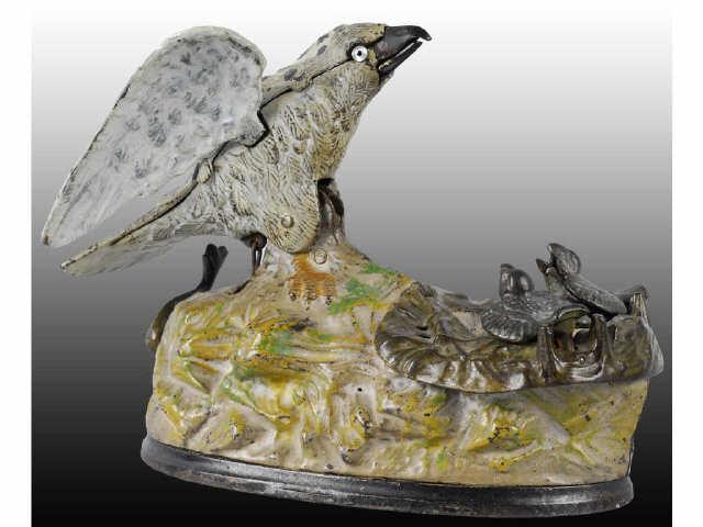 Appraisal: Cast Iron Eagle Eaglets Mechanical Bank Description Manufactured by J