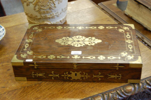 Appraisal: A th century brass inlaid rosewood sewing box the interior