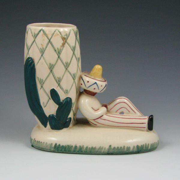 Appraisal: Abingdon vase with a Mexican figure resting against a cactus