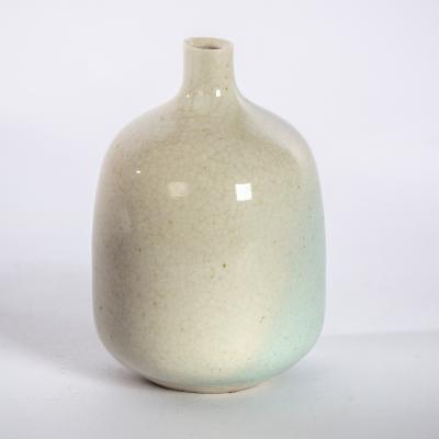 Appraisal: Derek Davis British - a porcelain bottle vase with narrow