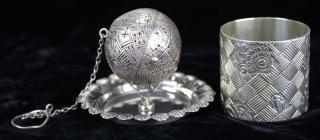 Appraisal: Ornate Gorham sterling tea ball infuser and unmarked sterling stand