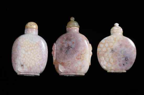 Appraisal: THREE CHINESE CORAL SNUFF BOTTLES Flattened ovoid-form one with fu