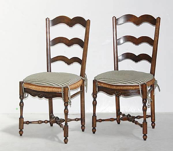 Appraisal: A set of four Provincial walnut ladder back chairs height