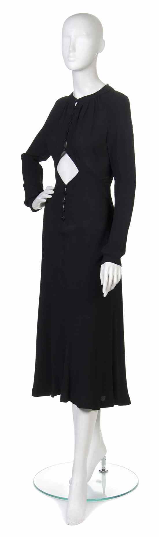 Appraisal: An Ossie Clark Black Moss Crepe Gown a button front