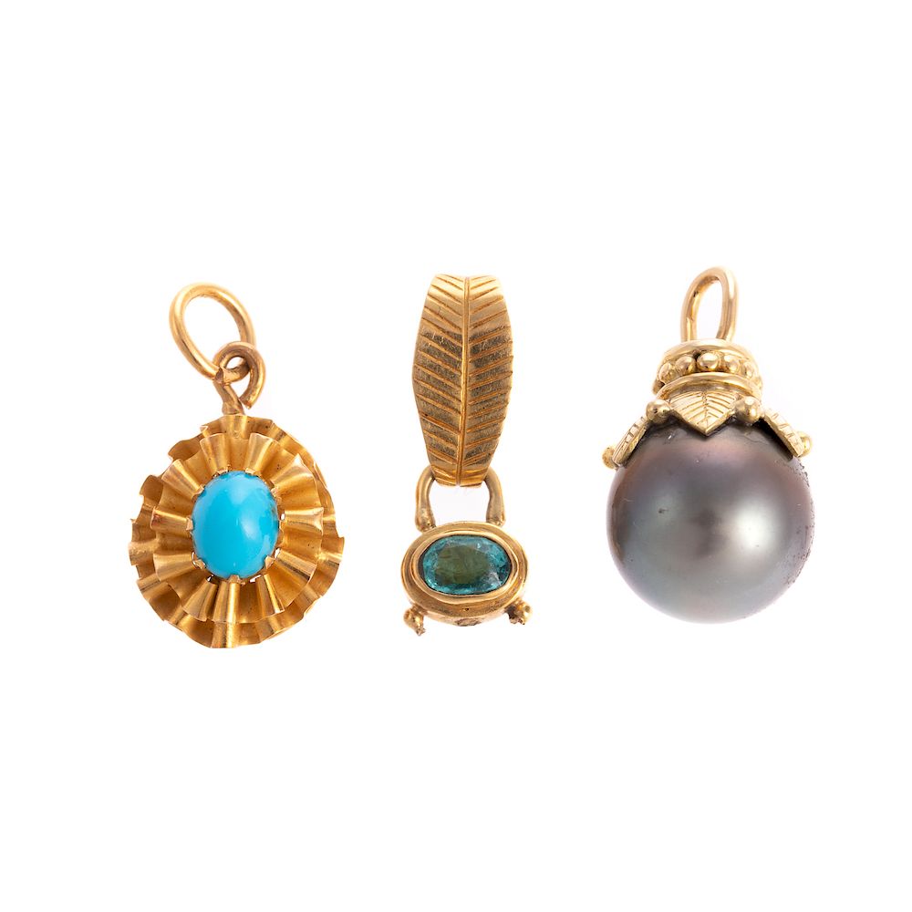 Appraisal: A Trio of Gemstone Pendants in Gold K yellow gold