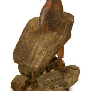 Appraisal: A Natural Stone and Patinated Bronze Figure of an Eagle