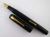 Appraisal: A Conway Stewart London fountain pen in black with silvered