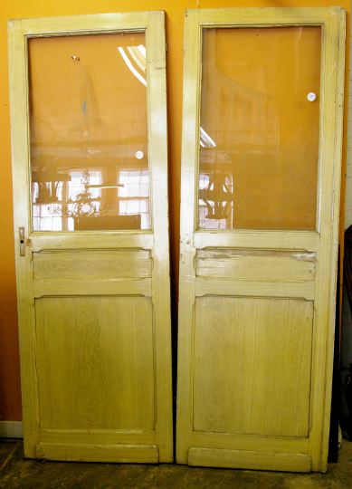 Appraisal: Large and Attractive Pair of Paneled Ivory-Painted Oak Doors the