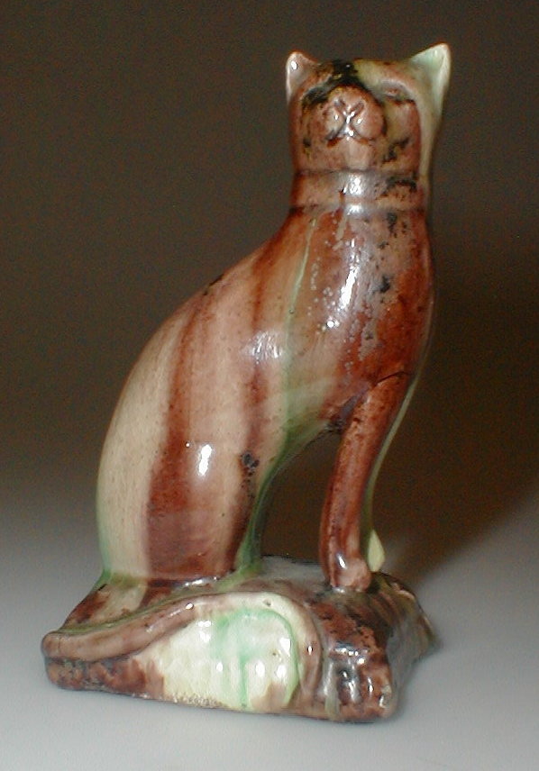 Appraisal: A Whieldon type pottery figure of a seated cat glazed