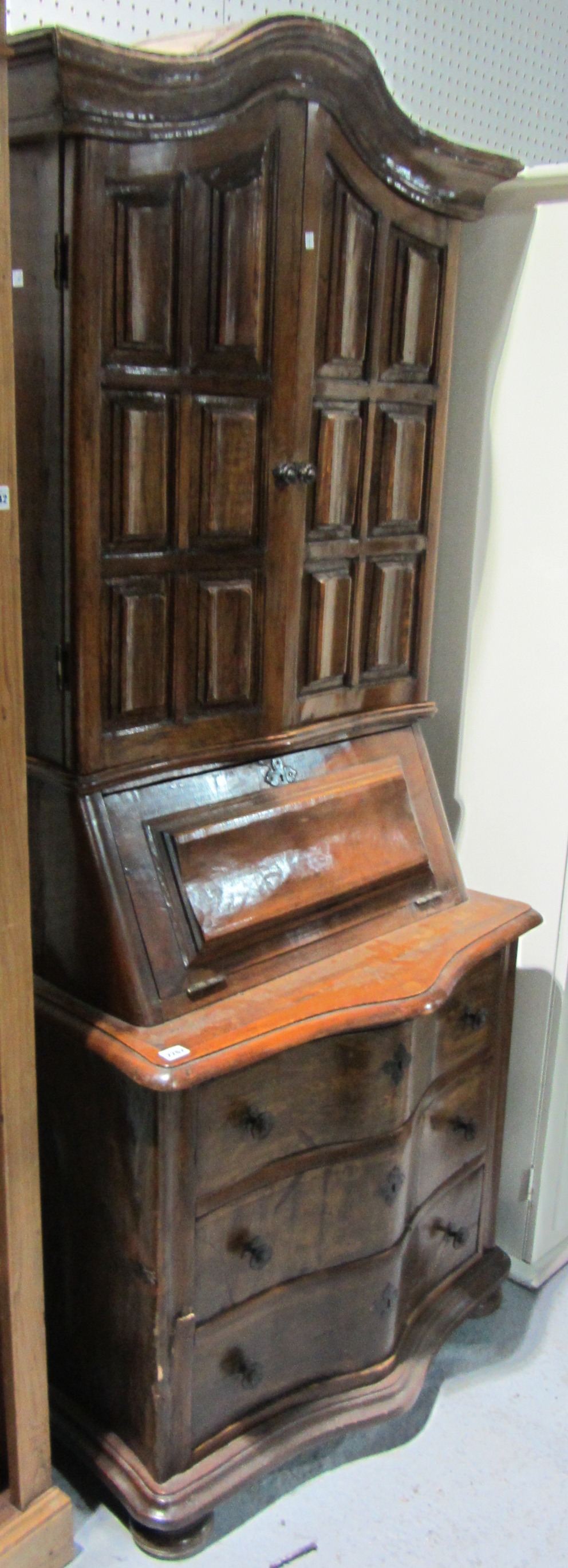 Appraisal: A th century continental walnut bureau bookcase the serpentine base