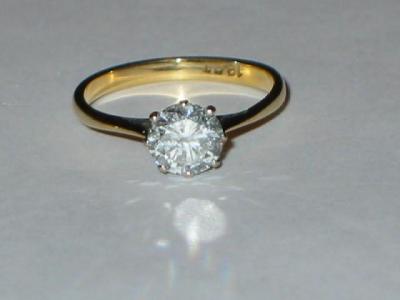 Appraisal: A SOLITAIRE DIAMOND RING the brilliant cut stone approximately cts