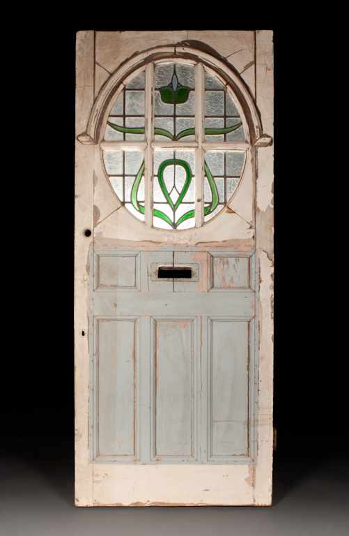 Appraisal: Edwardian Art Nouveau style painted wood door with stained and