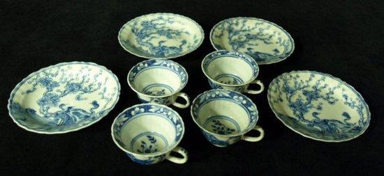 Appraisal: Four Japanese blue and white tea cups and saucers decorated