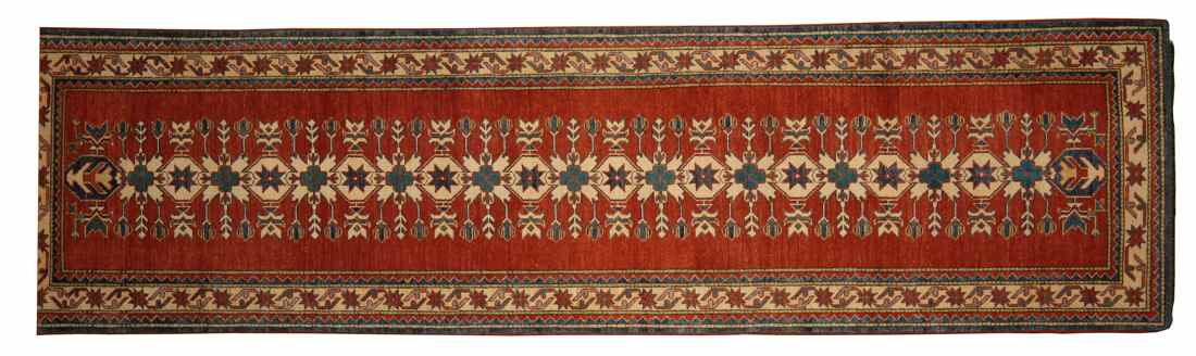 Appraisal: ORIENTAL RUG KAZAK DESIGN RUNNER ' x ' Geometric elements