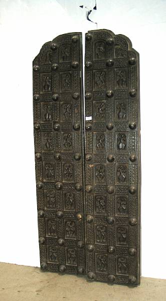 Appraisal: A pair of Indian carved wood door panels Each carved